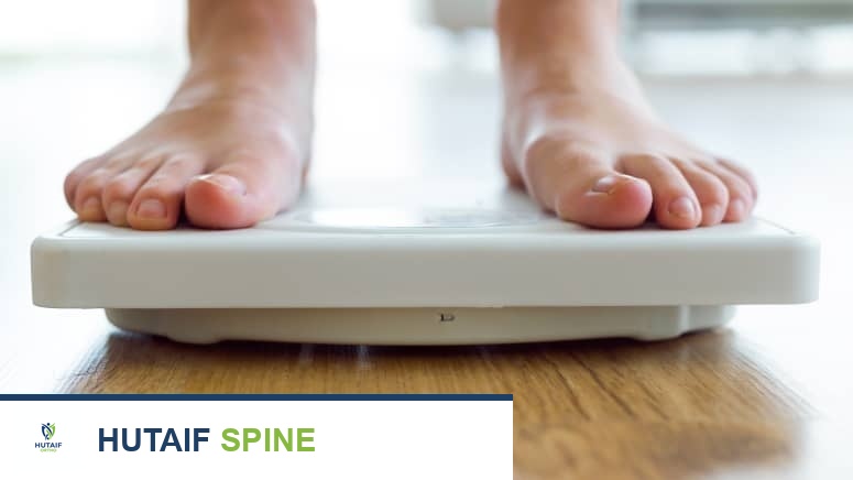 آلام الظهر والوزن الزائد: كيف يساعد فقدان الوزن في تخفيف الألم وتحسين صحة عمودك الفقري