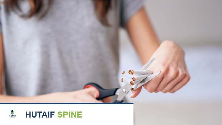 التدخين وآلام أسفل الظهر: هل هناك علاقة؟ دليل شامل من الأستاذ الدكتور محمد هطيف