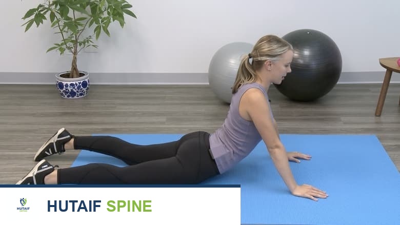 تمرين طريقة ماكنزي للظهر بالبسط في وضعية الاستلقاء أو الضغط للأعلى على البطن